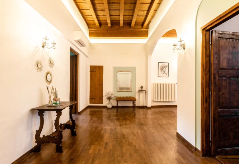 Entrance hall with wooden ceiling, Florence Palace apartment in Santa Croce